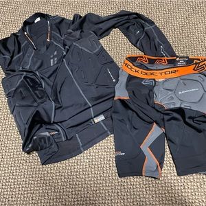 Shock Doctor padded compression shirt and shorts. No tags but new.